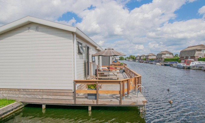 Municipality of Stichtse Vecht Boat Rental | Waterfront chalet with jetty