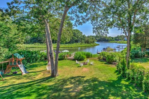 North Sea Apartment | Waterfront Haven, Beach, Dock, Canoe, Paddle Board, - Boat, and Jet Ski available for rent