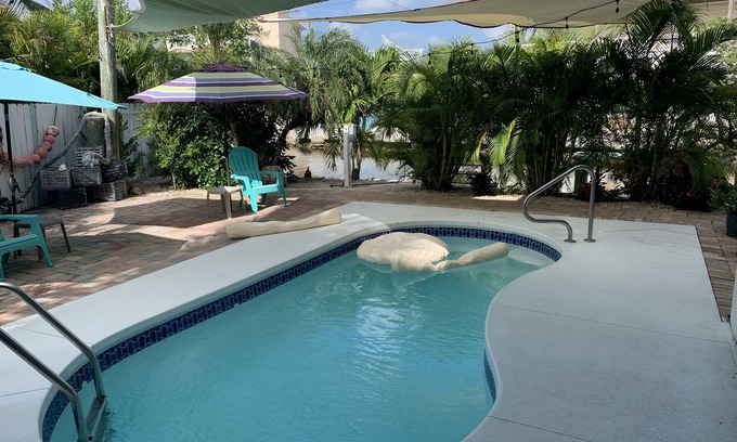 Cutthroat Harbor Estates House | Waterfront, Heated-chilled pool, Outdoor kitchen, downstairs bathroom w/shower!