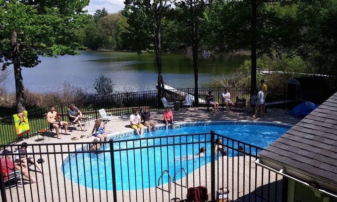 Interlochen House | Waterfront home in Lake Ann with outdoor pool. Pet ok, row boat, kayak, canoe