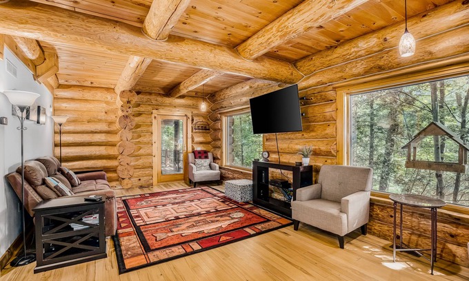 Thompsonville House | Waterfront home on Betsie River with hot tub & sauna near skiing at Crystal Mtn