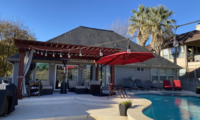 Granite Shoals House | Waterfront Home with pool Surrounded by Palm Trees