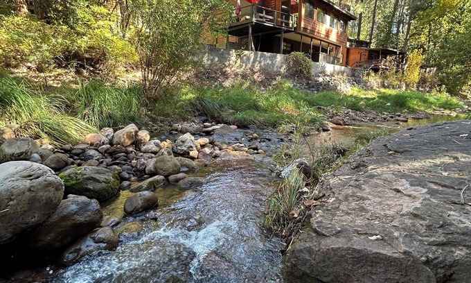 Kohls Ranch Cabin | Waterfront luxurious midcentury Log cabin