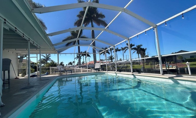 Caloosahatchee House | Waterfront, pet-friendly home in sunny SE Cape Coral with WiFi, AC, heated pool