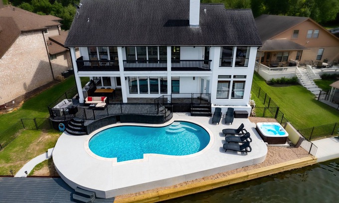 Walden on Lake Conroe Villa | Waterfront villa w/pool, hot tub, outdoor kitchen.