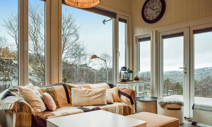 Spangereid House | Welcome to this quality holiday home with great mountain views.