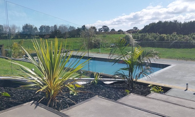 Muriwai House | Whole house, heated pool, spa, gym!