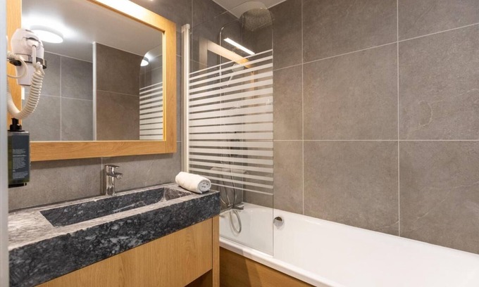 Belle Plagne Apartment | Wifi, 50m from ski slopes, fitness, swimming pool, sauna, balcony, fireplace or stove, tv