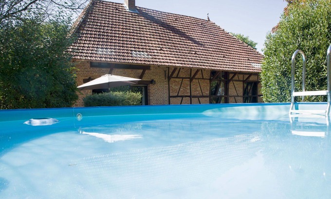 La Chapelle-Saint-Sauveur Villa | Wonderful private villa for 8 guests with private pool, WIFI, TV, terrace, pets allowed and park.