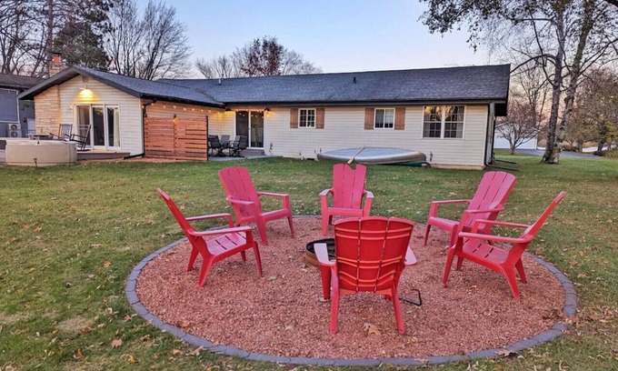 Wausau House | Wooded waterfront retreat with hot tub & fire pit