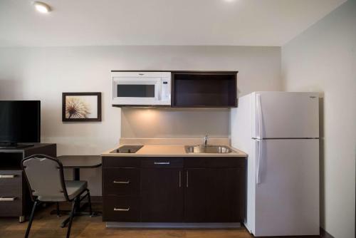 Rosemont Hotel | WoodSpring Suites Orlando North - Maitland