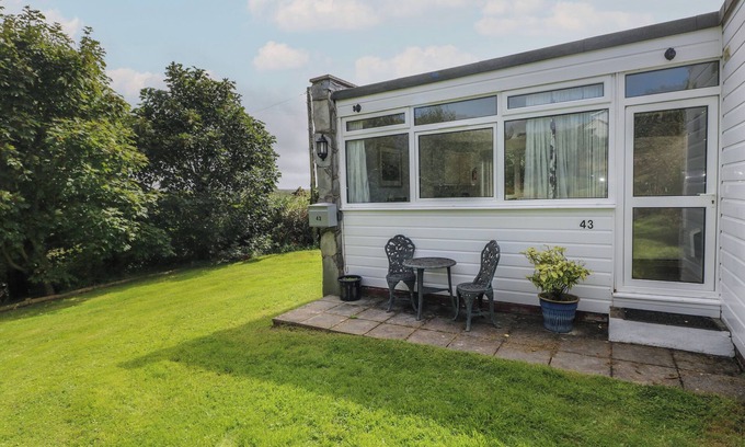 Nolton Cottage | Y TWLL BOLLT (THE BOLT HOLE), pet friendly in Nolton Haven