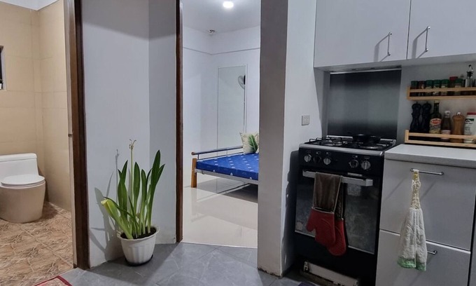 Agdangan House | Your cozy retreat surrounded by nature.nEnjoy our huge terrace with pool table.