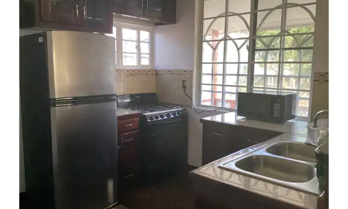 Dangriga House | Zuri Joi’s: 2 BR home w/AC,WiFi, parking @airstrip