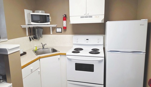 Signature Studio Suite, 1 King Bed, Kitchenette, Ground Floor