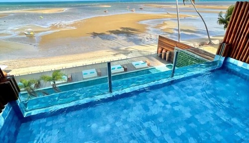 Quarto com Cama King-size e Vista do Mar