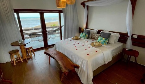 Quarto Duplo Deluxe com Varanda e Vista do Mar