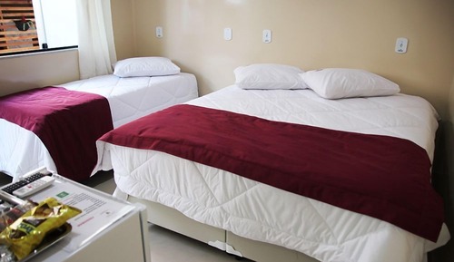 Quarto triplo luxo com escada