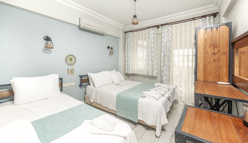 Deluxe Triple Room, Balcony, Garden View