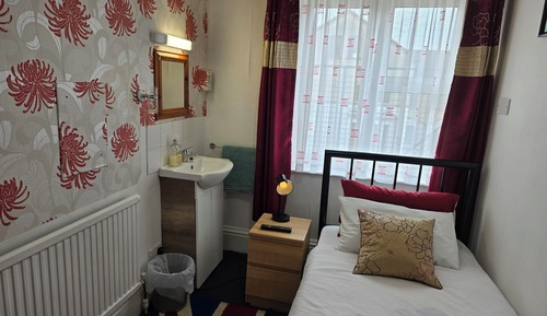 Basic Single Room, 1 Twin Bed, Shared Bathroom (203)
