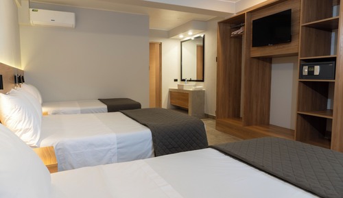 Deluxe Triple Room, Balcony, City View