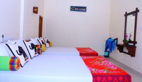 Deluxe Quadruple Room, Garden View