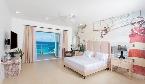 Standard Room, 1 King Bed, Balcony, Beach View