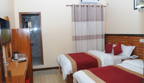 Deluxe Quadruple Room, City View