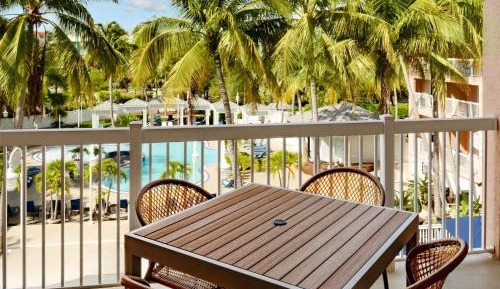 Queen Suite with Two Queen Beds and Balcony with Pool View