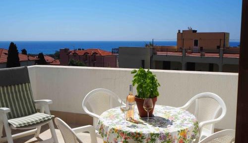 One-Bedroom Apartment with Balcony and Sea View