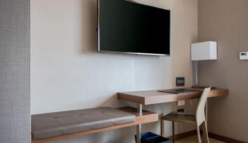 Corner King Room with Sofa Bed and City View