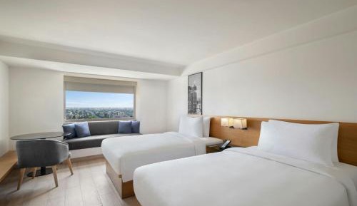 Premium Larger Twin Room with Two Twin Beds, Airport View and City View: Enjoy 15% discount on F&B and Laundry services