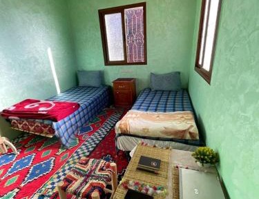 Basic Triple Room with Shared Bathroom