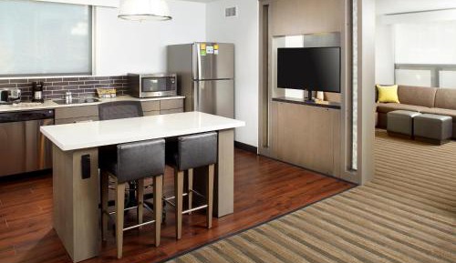 Specialty King Suite with Kitchen and Sofa Bed