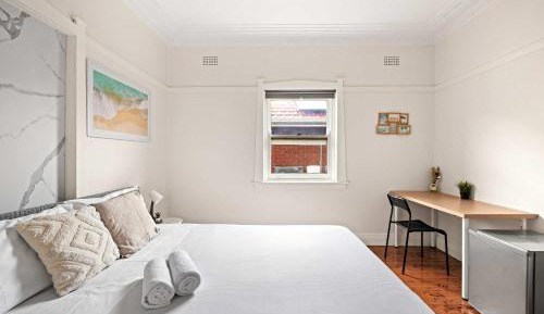 Queen Room with Shared Bathroom