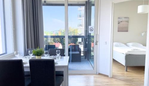 One-Bedroom Apartment with Balcony and City View