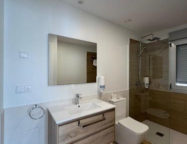 One-Bedroom Apartment with Balcony and City View