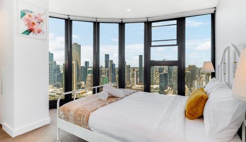 Three-Bedroom Apartment with City and River views