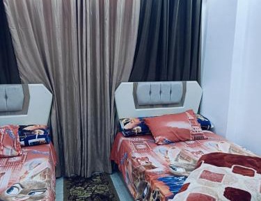 Three-Bedroom Premium Apartment with Balcony