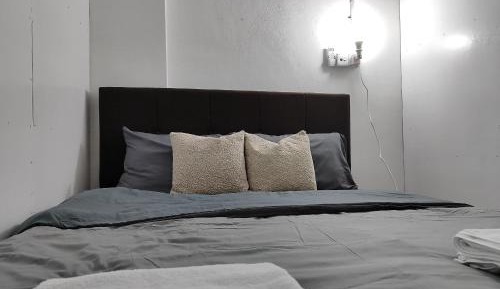 Queen Room with Shared Bathroom
