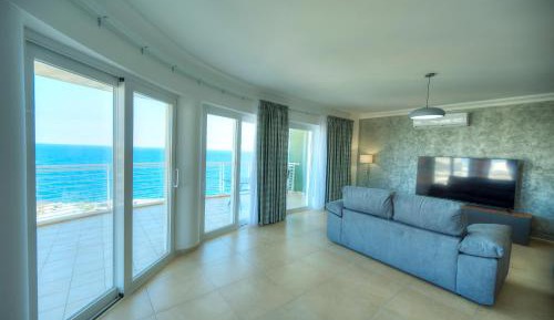 Three-Bedroom Apartment with Sea View