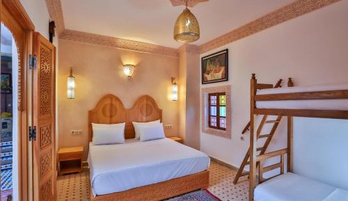 Quadruple Room with Private Bathroom