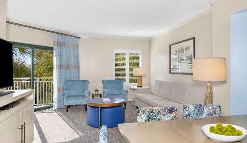 Two-Bedroom Villa with One King and Two Queen Beds with Sofa Bed and Garden View