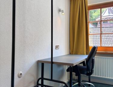 Single Room with Shared Shower and Toilet