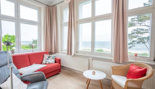 One-Bedroom Apartment with Balcony and Sea View