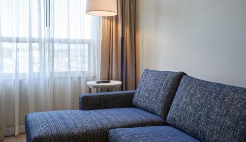 Corner King Suite with Sofa Bed