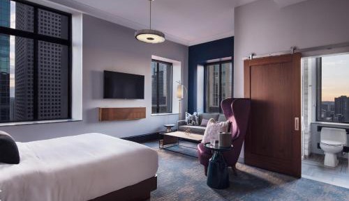 Premier King Suite with Sofa Bed and City View