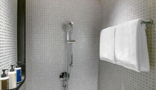 Premier Twin Room with Complimentary IMFL from 6:00 pm to 8 pm at Barcode and Shared Airport Transfer