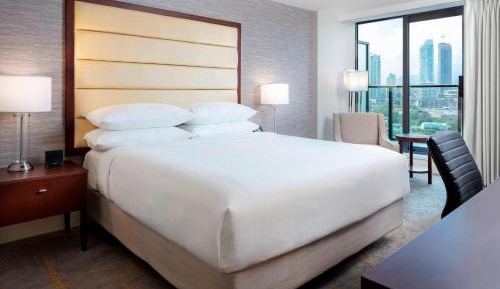 King Guest Room with Balcony and City View