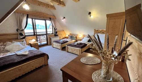 Deluxe Quadruple Room with Balcony